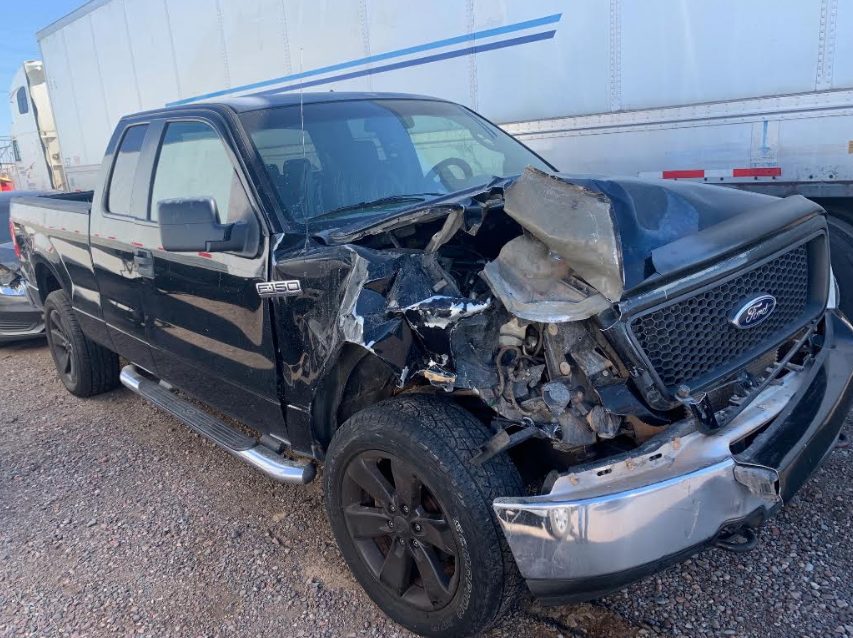 Wrecked Ford F-150 bought for cash in Phoenix